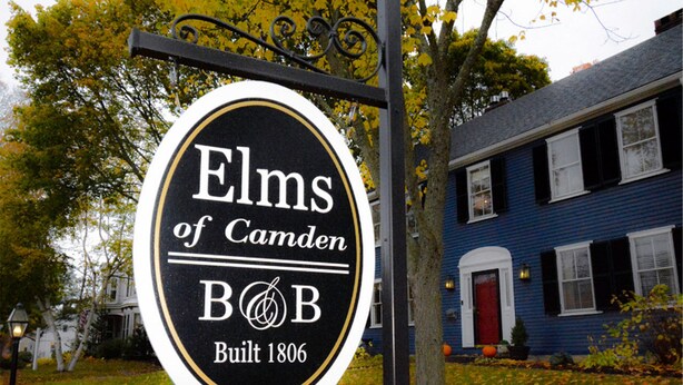 A sign for 'Elms of Camden' with a black and white design, indicating it was built in 1806. - Elms of Camden (Camden)
