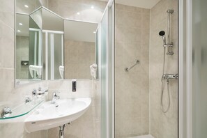 Shower, free toiletries, hair dryer, towels