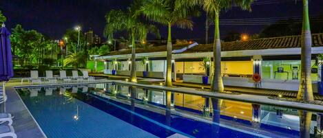 2 outdoor pools, open 7 AM to 10:30 PM, pool umbrellas, pool loungers