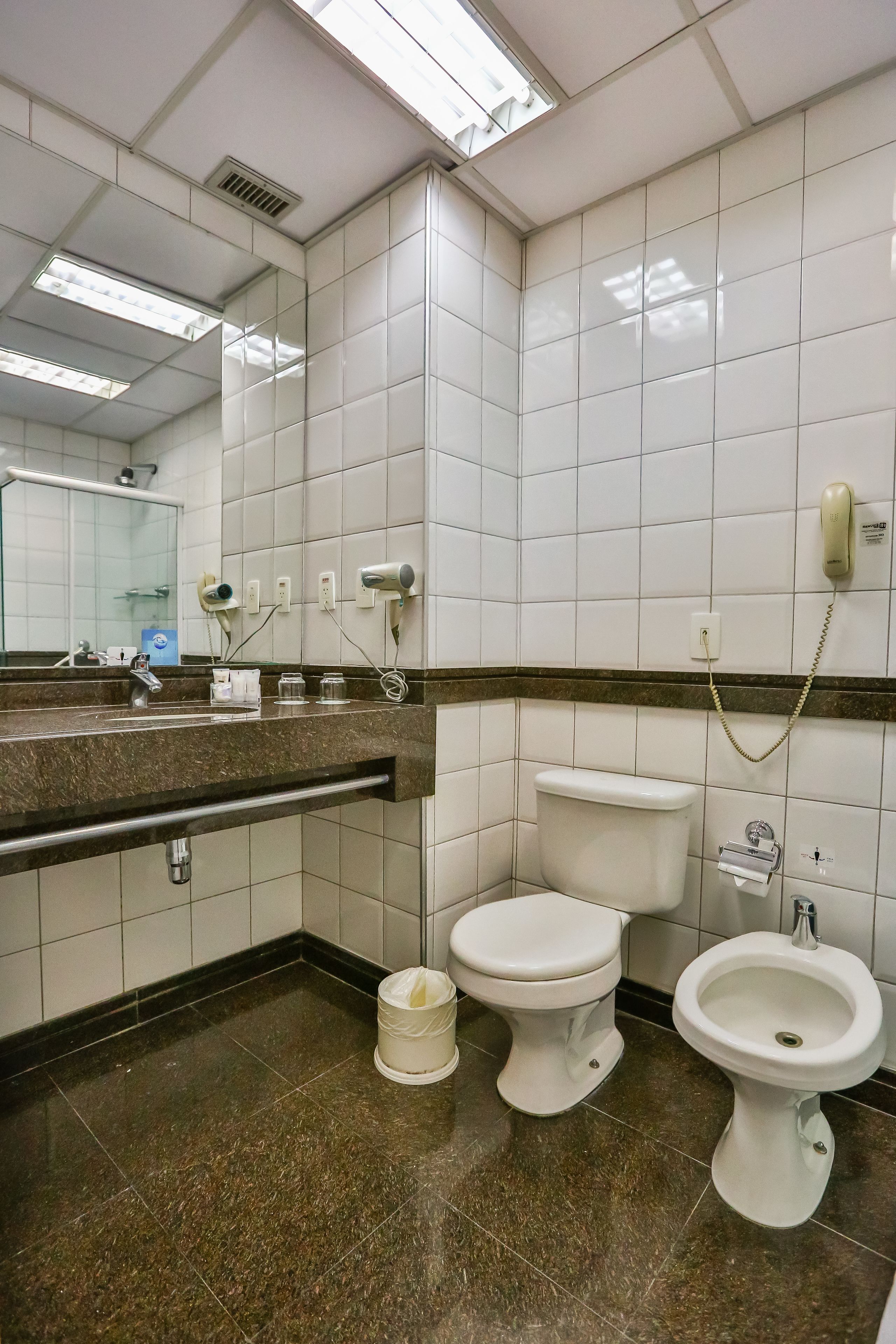 deluxe double room | bathroom | shower, hair dryer, towels