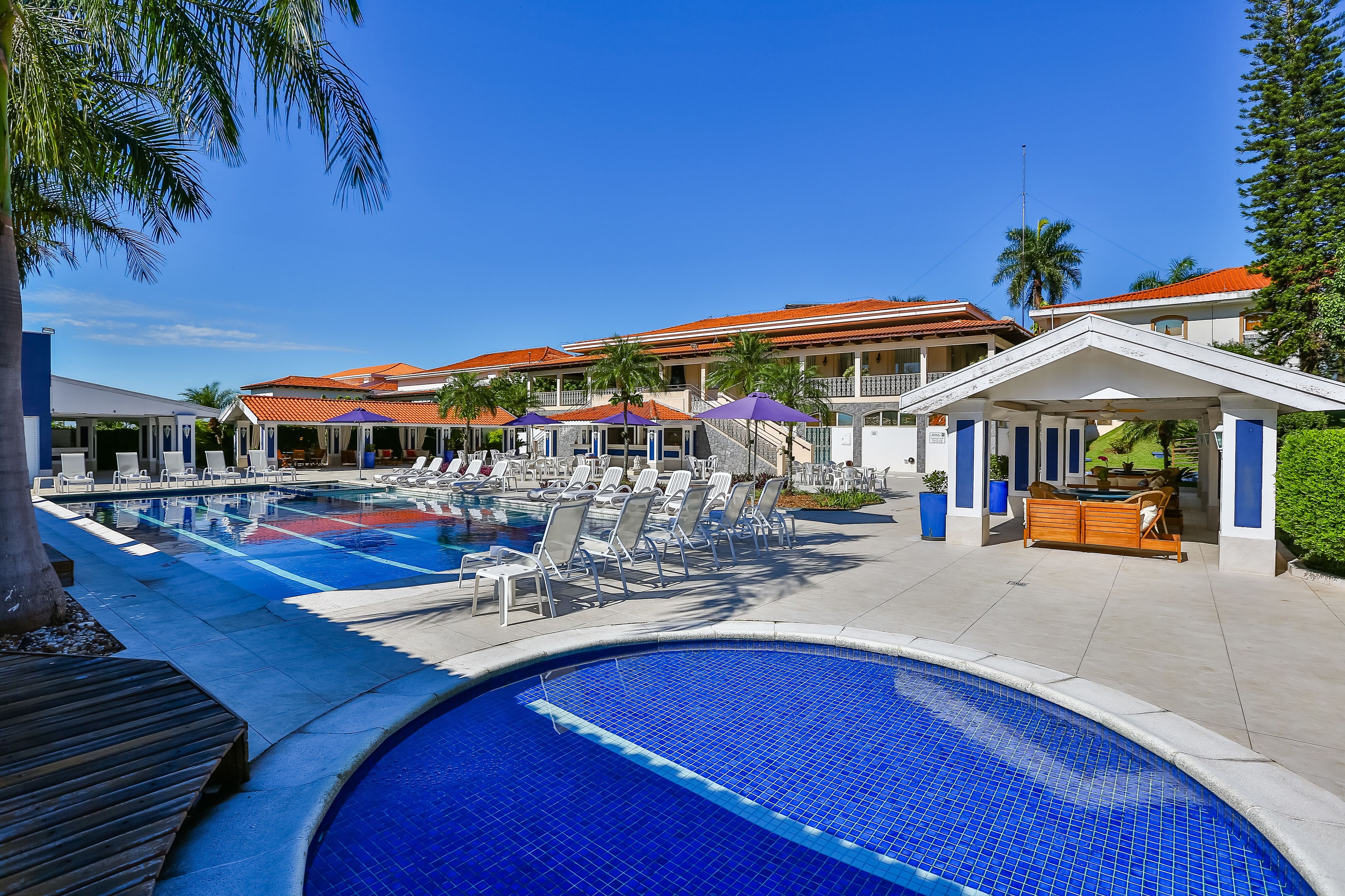 2 outdoor pools, open 7 am to 10:30 pm, pool umbrellas, pool loungers