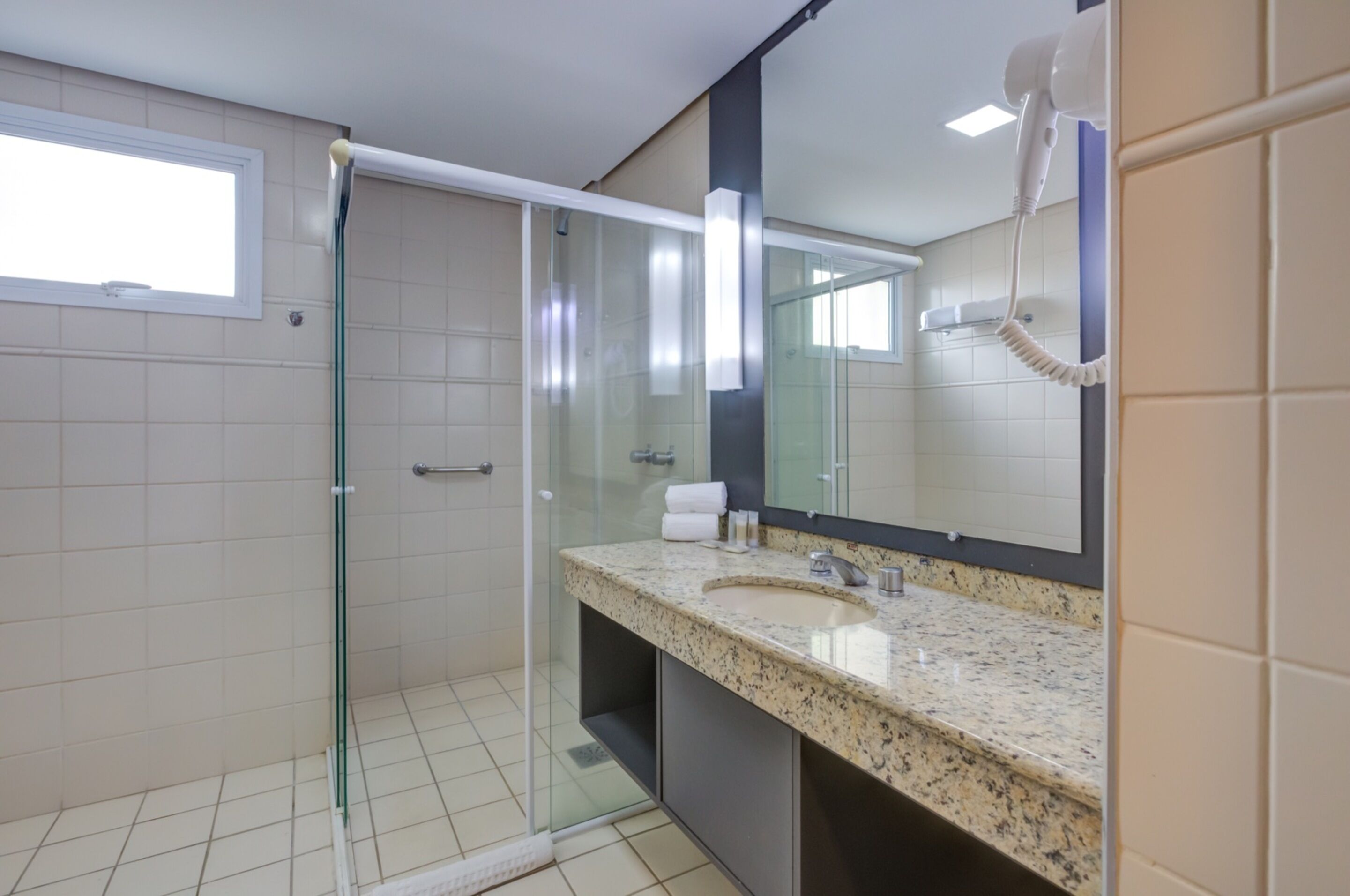 shower, free toiletries, hair dryer, towels