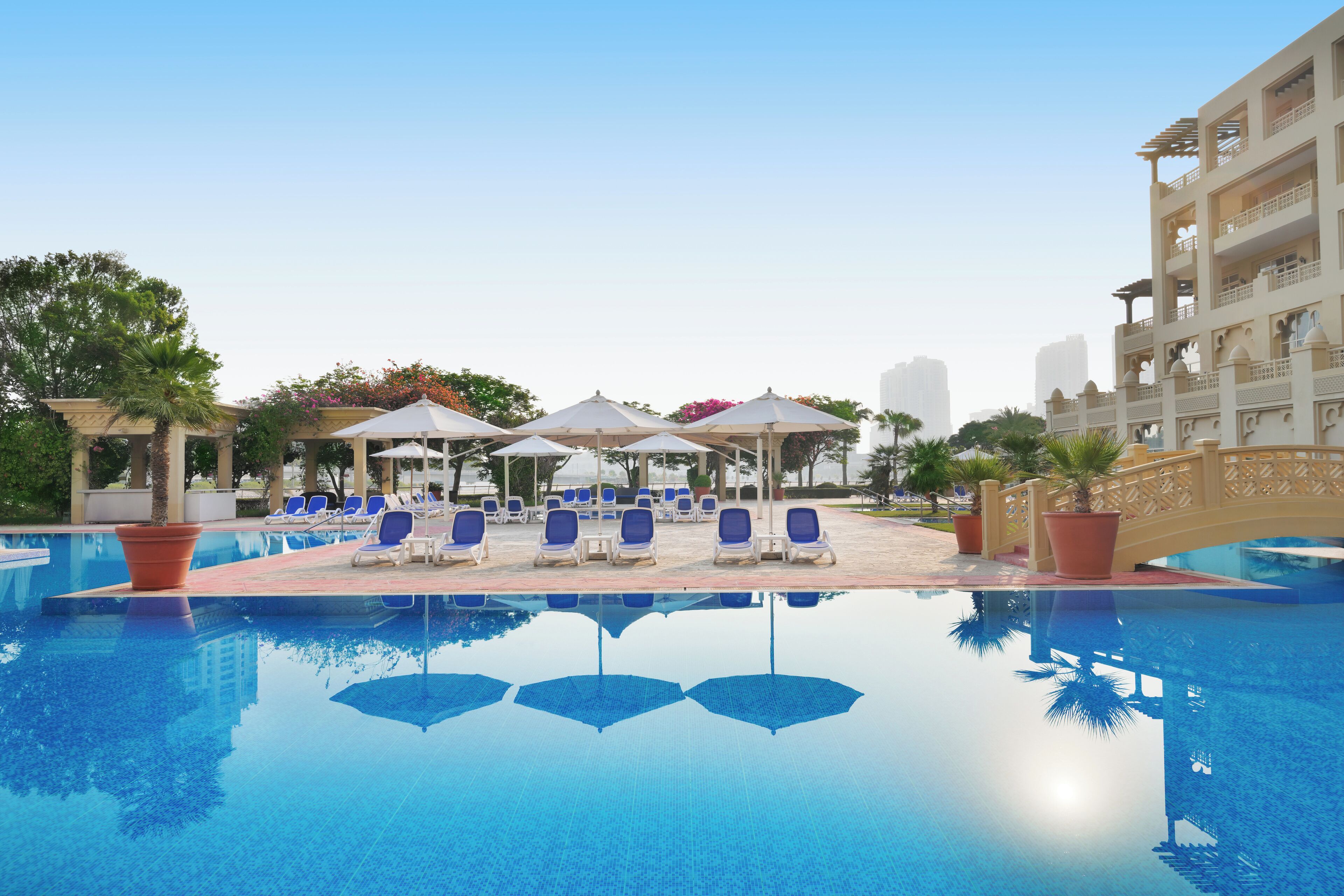indoor pool, 4 outdoor pools, open 7:00 am to 8:00 pm, pool umbrellas