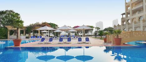 Indoor pool, 4 outdoor pools, cabanas (surcharge), pool umbrellas