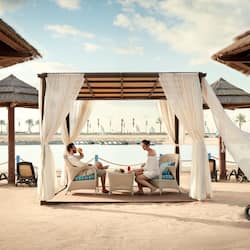 On the beach, free beach cabanas, sun loungers, beach umbrellas