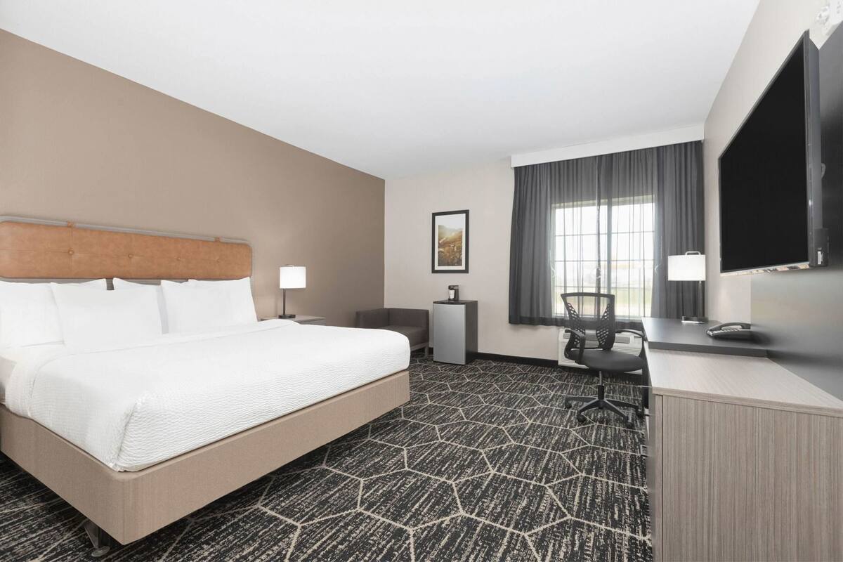 Premium bedding, desk, blackout curtains, iron/ironing board