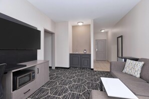 Suite Deluxe, 1 très grand lit, non-fumeur | Literie de qualité, bureau, rideaux d’obscurcissement