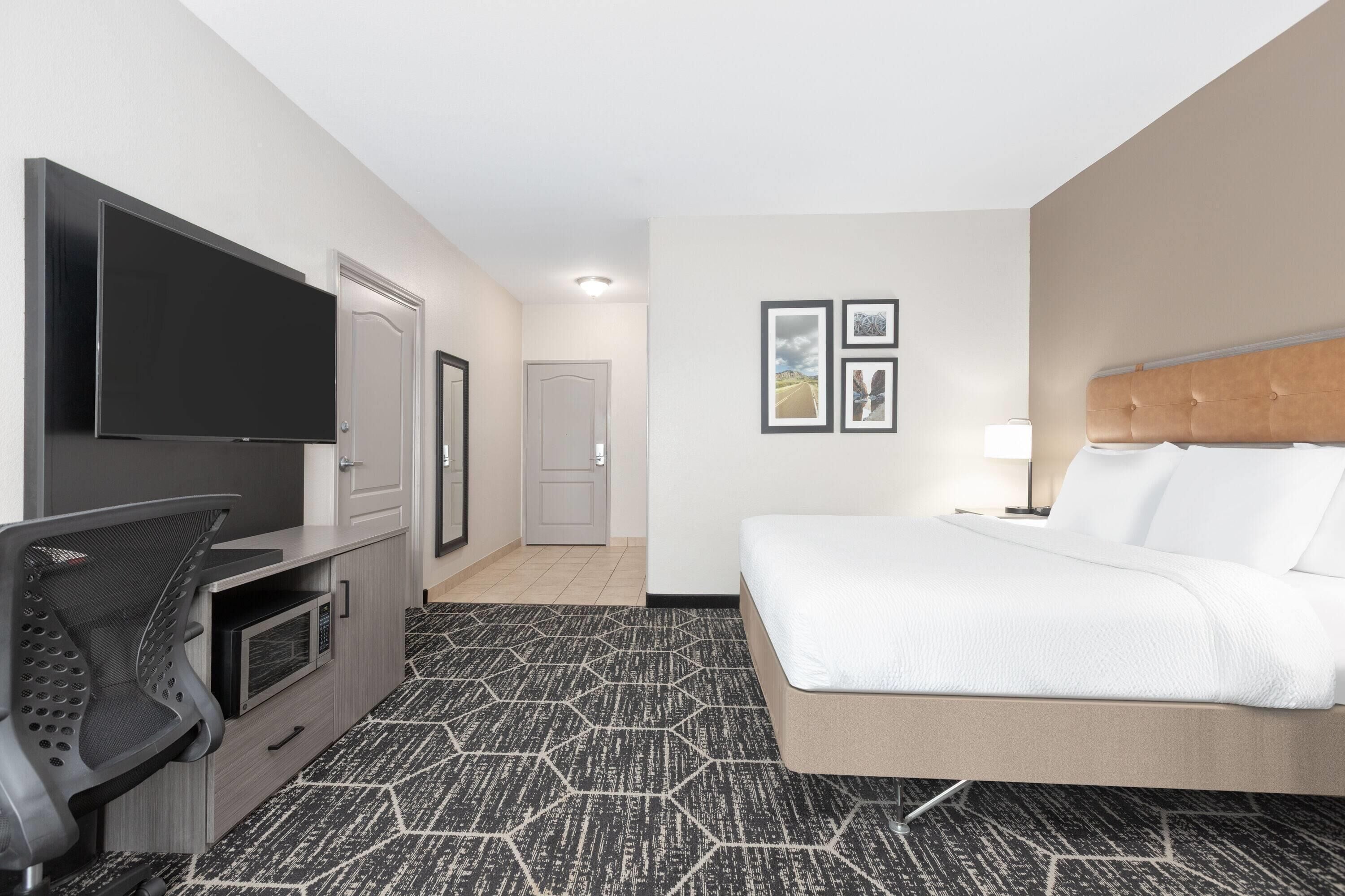 Premium bedding, desk, blackout curtains, iron/ironing board