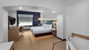 A modern hotel room with a bed, desk, and a large window. - La Quinta Inn & Suites by Wyndham San Antonio Northwest (San Antonio)