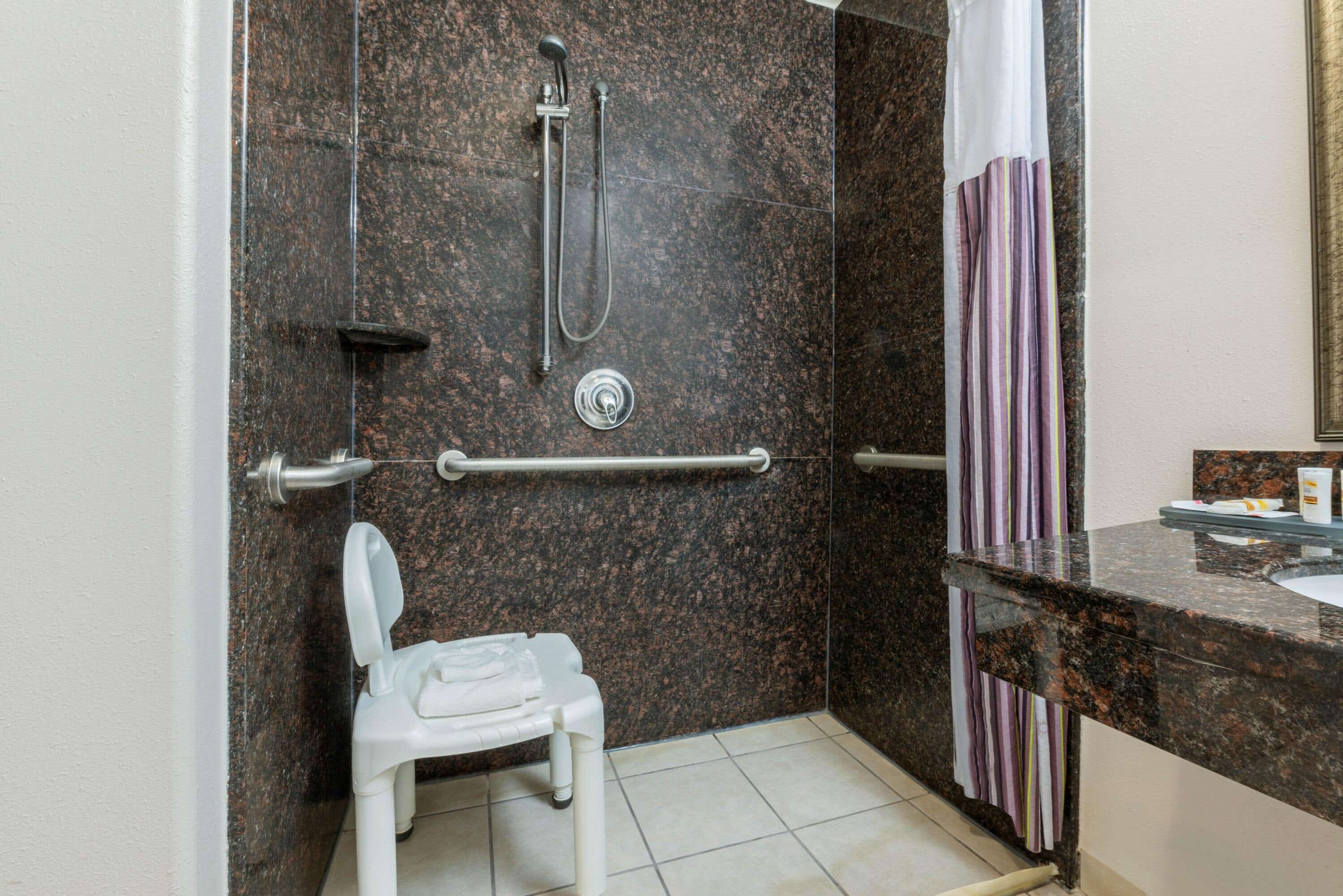 combined shower/bathtub, free toiletries, hair dryer, towels