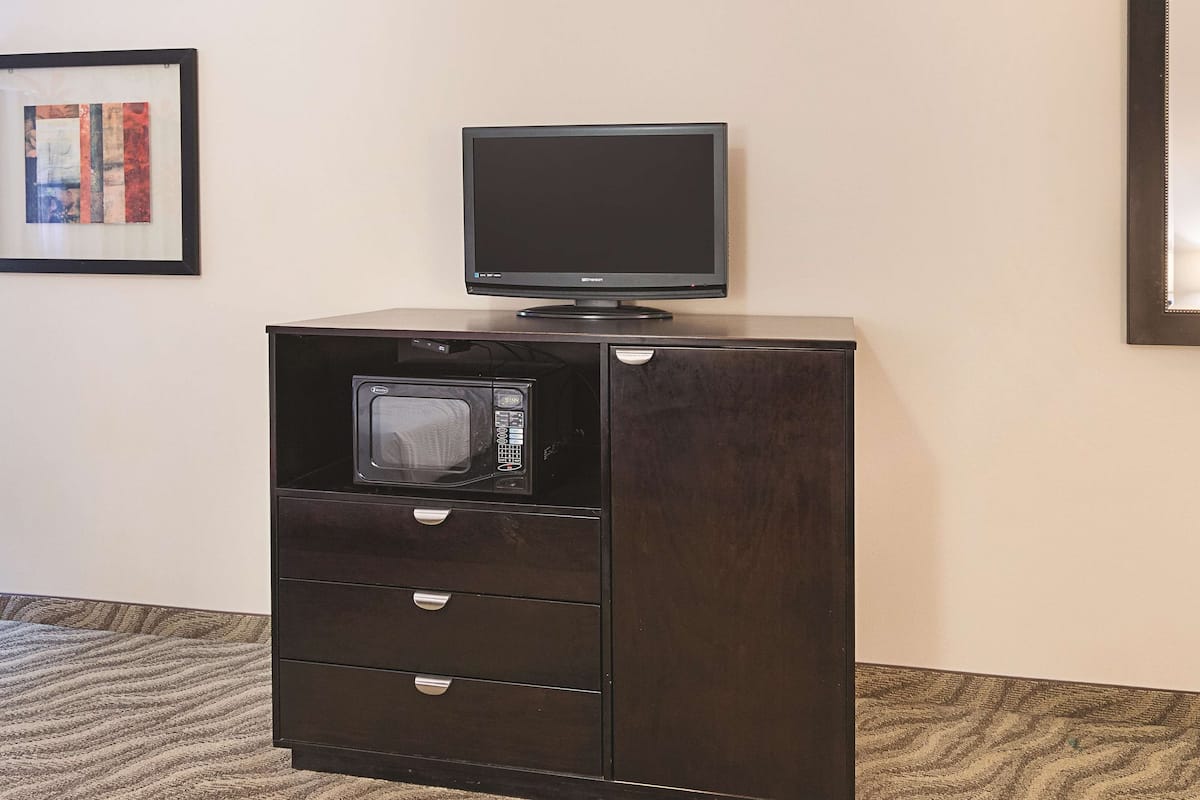 premium bedding, desk, laptop workspace, blackout curtains