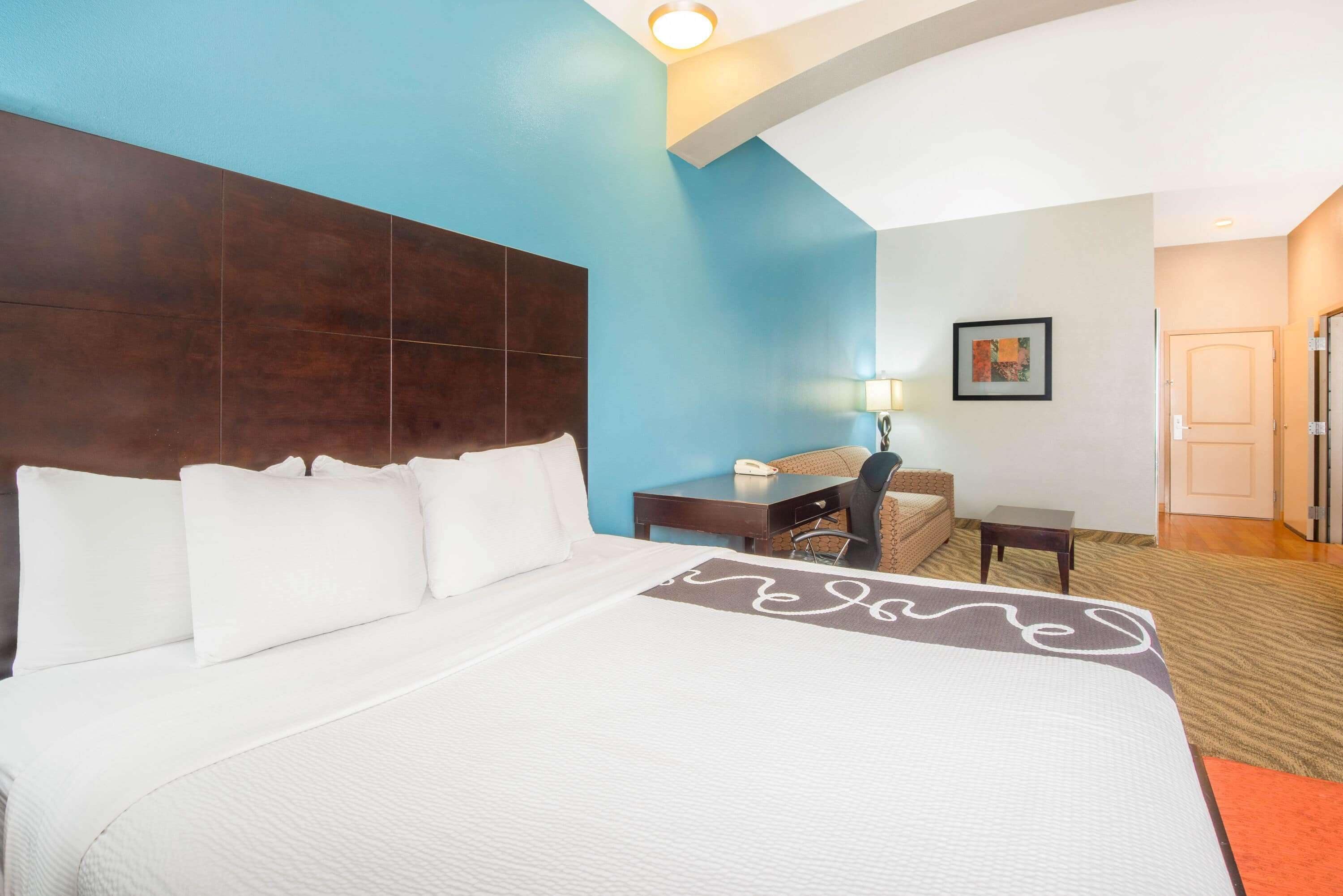 premium bedding, desk, laptop workspace, blackout curtains