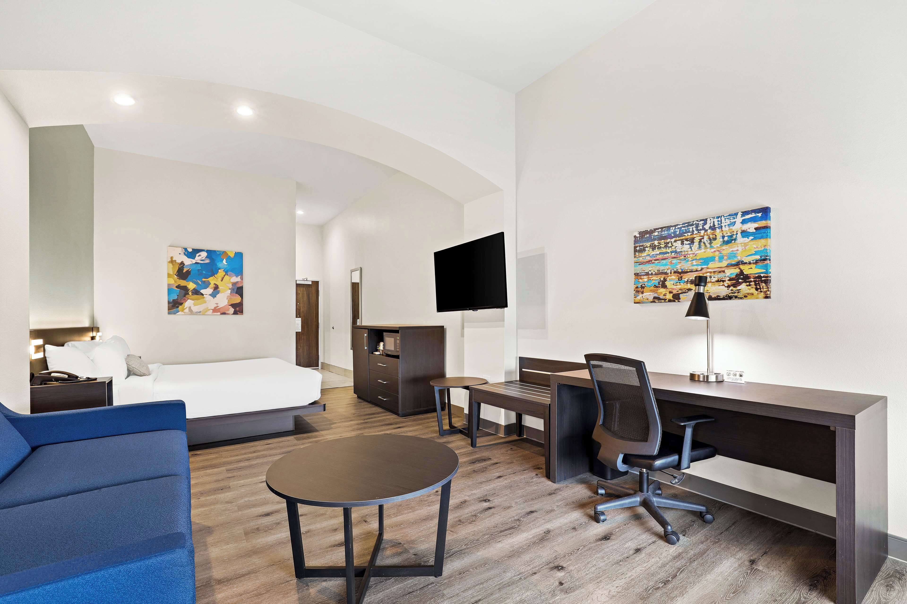 suite, 1 king bed, accessible, refrigerator & microwave | premium bedding, desk, laptop workspace, iron/ironing board