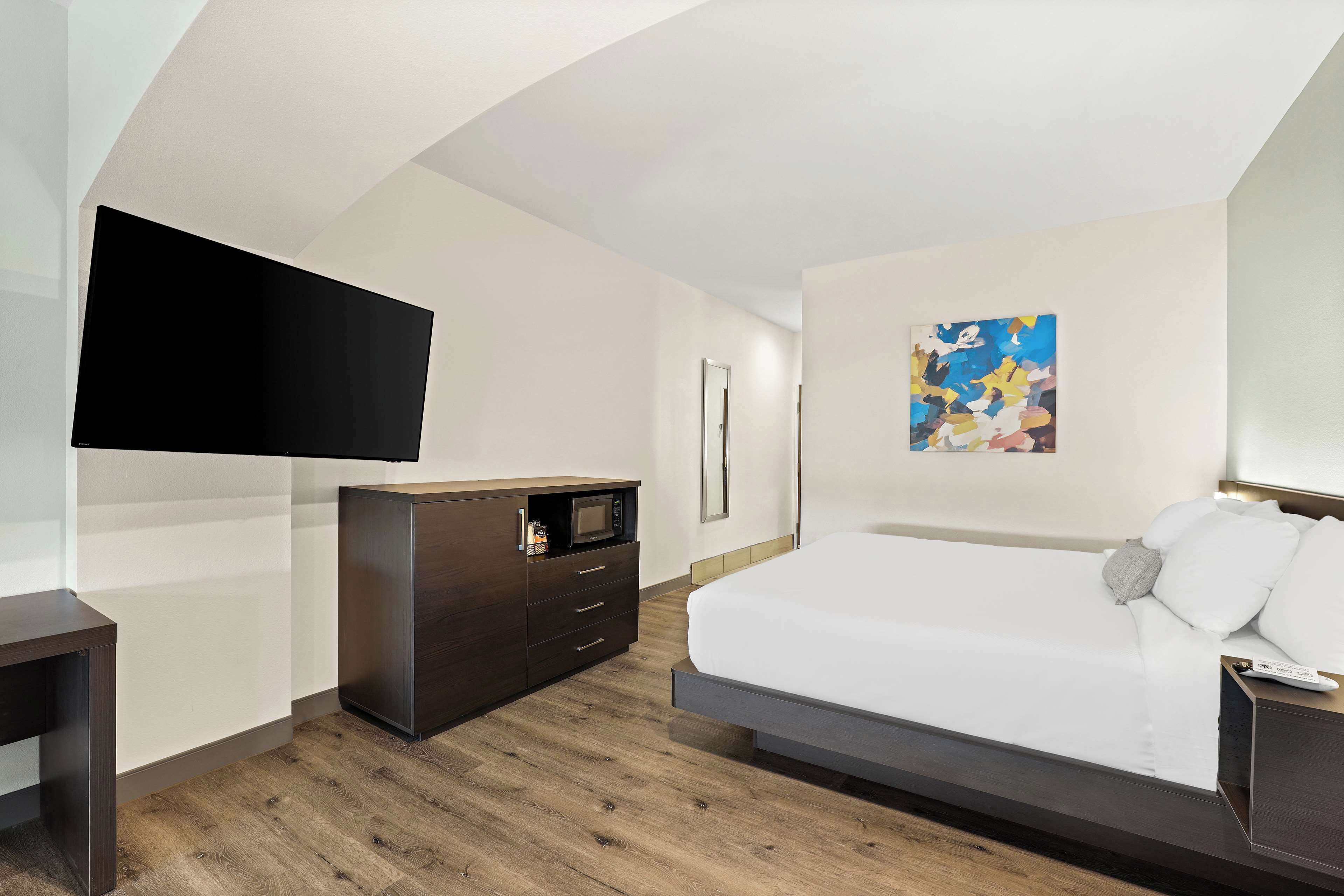 suite, 1 king bed, non smoking, refrigerator & microwave | premium bedding, desk, laptop workspace, iron/ironing board