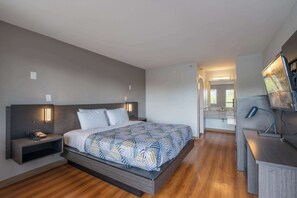 Habitación estándar, 1 cama de matrimonio grande, fumadores | Ropa de cama y despertador