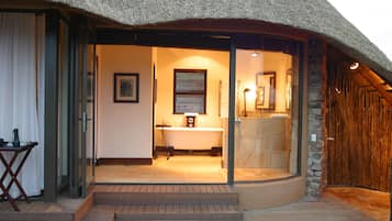 Separate bathtub and shower, slippers, towels