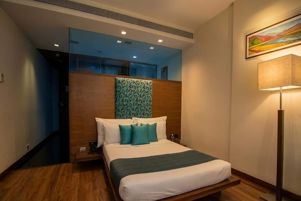 Chambre Simple Exécutive | Literie de qualité supérieure, minibar, coffres-forts dans les chambres