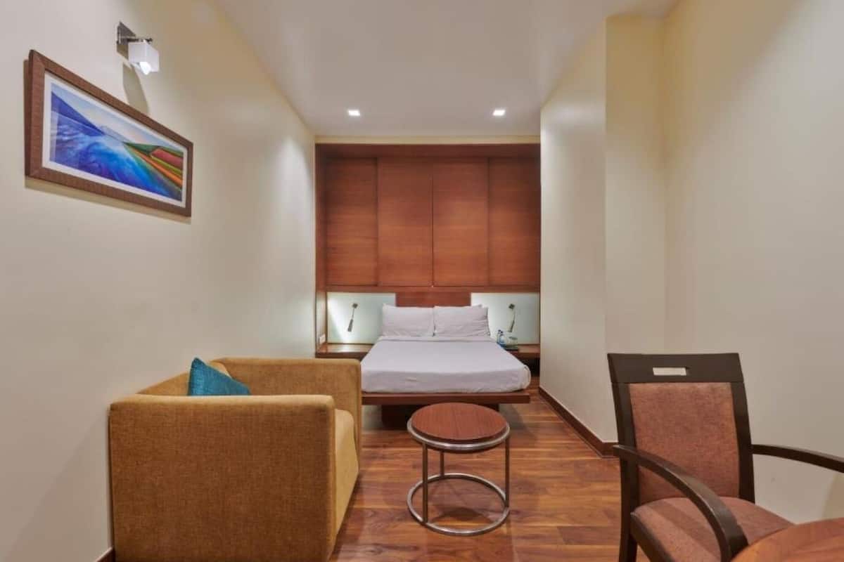 Chambre Deluxe (Contemporary) | Literie de qualité supérieure, minibar, coffres-forts dans les chambres