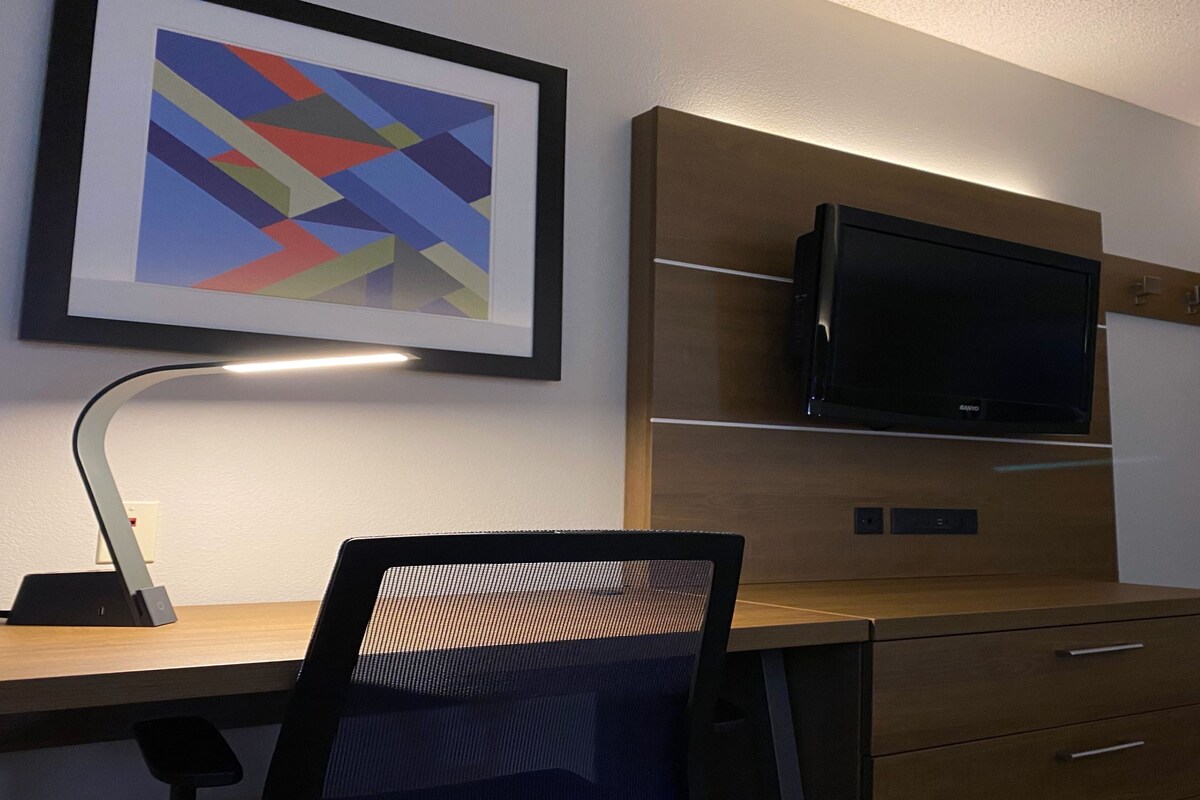 Desk, laptop workspace, blackout curtains, iron/ironing board