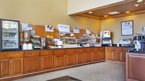A breakfast buffet area with various food options and a coffee station. - Holiday Inn Express & Suites Somerset Central by IHG (Somerset)