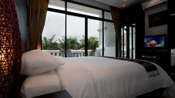 Habitación familiar, 2 habitaciones, cocineta | Baño | Secadora de cabello, batas, toallas