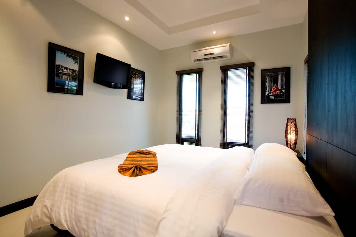 Family Room, 3 Bedrooms, Kitchenette | In-room safe, desk, blackout drapes, iron/ironing board