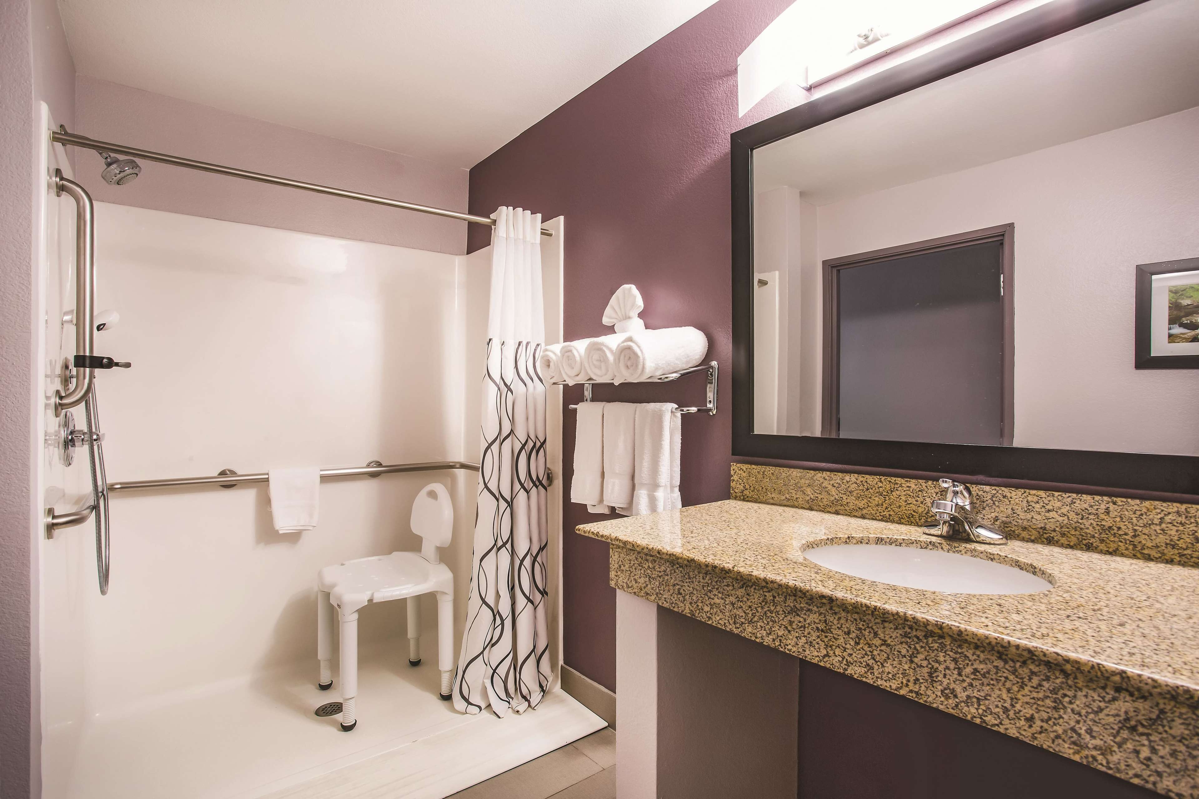 premium bedding, desk, blackout curtains, iron/ironing board