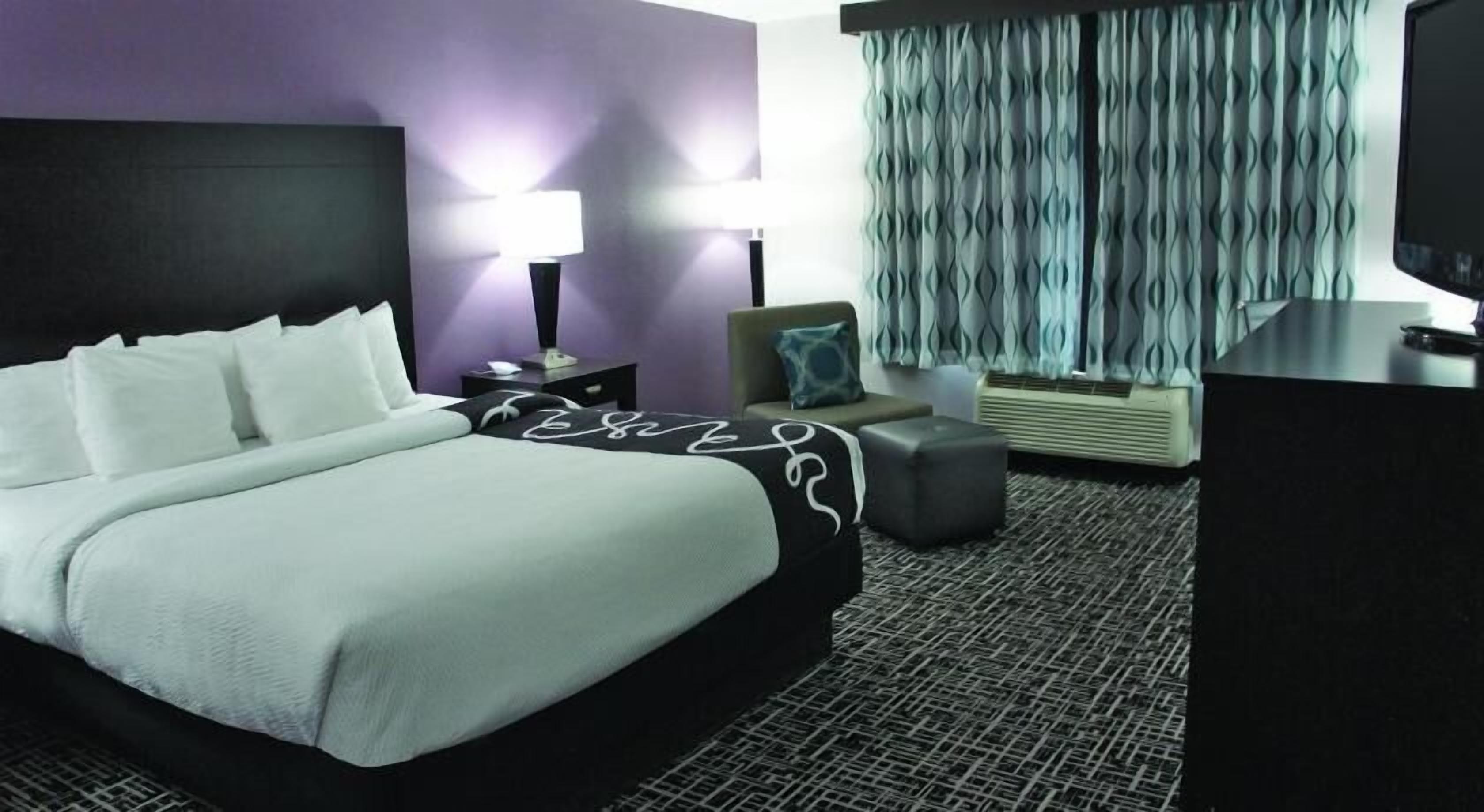 Premium bedding, desk, blackout drapes, iron/ironing board