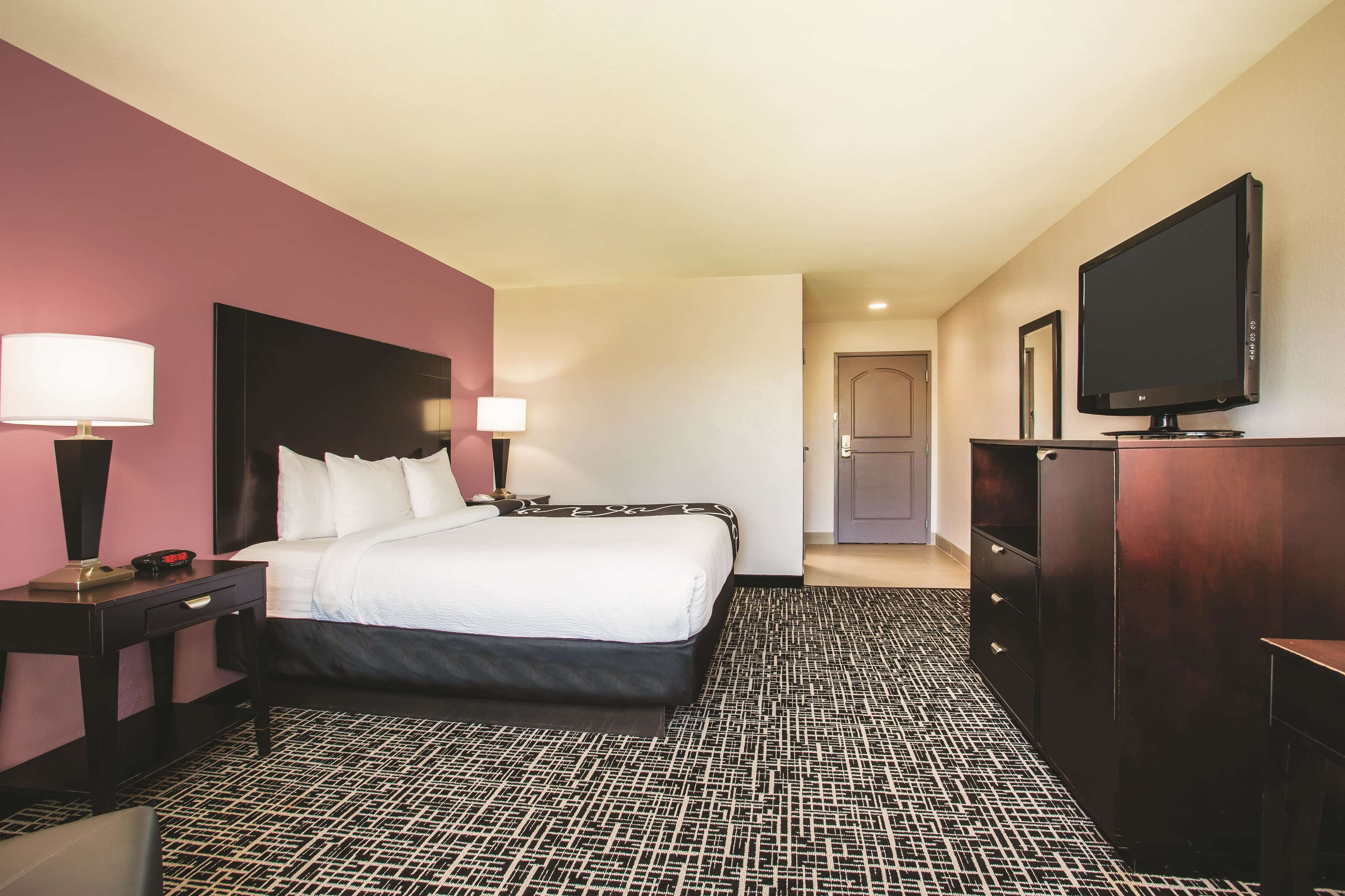 premium bedding, desk, blackout curtains, iron/ironing board