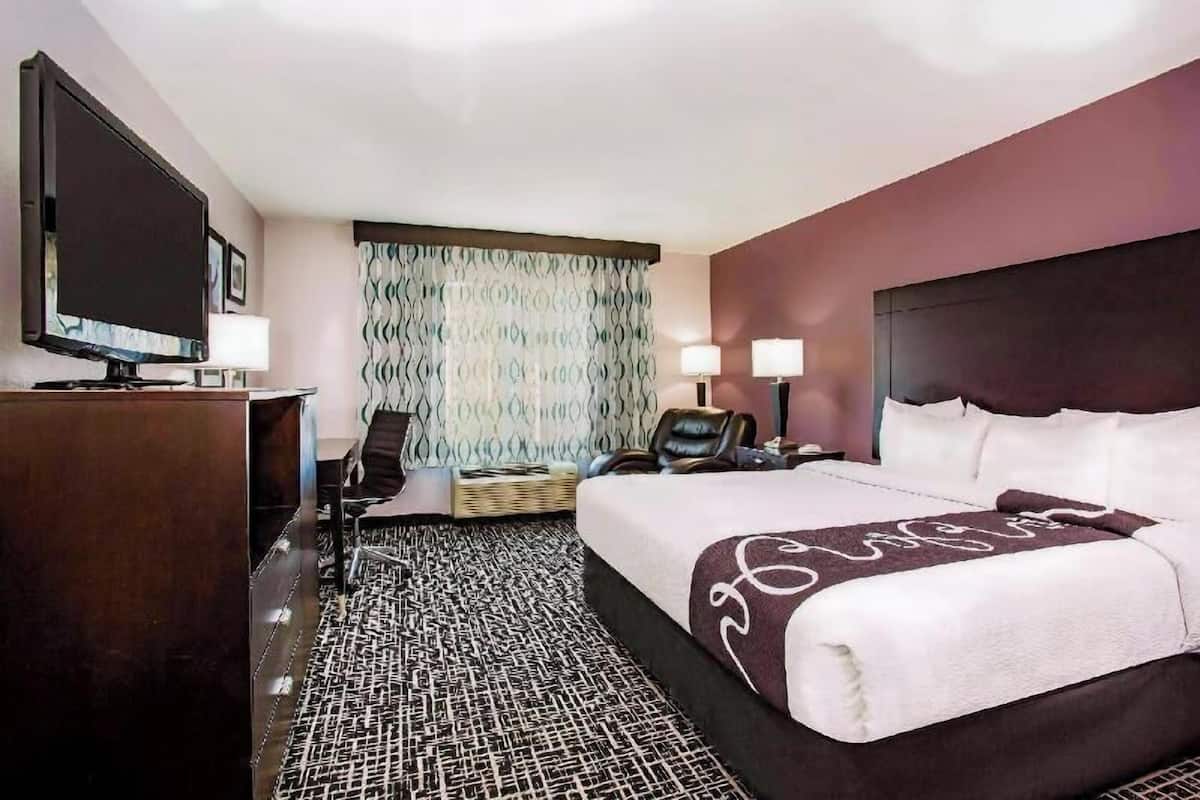 Premium bedding, desk, blackout drapes, iron/ironing board