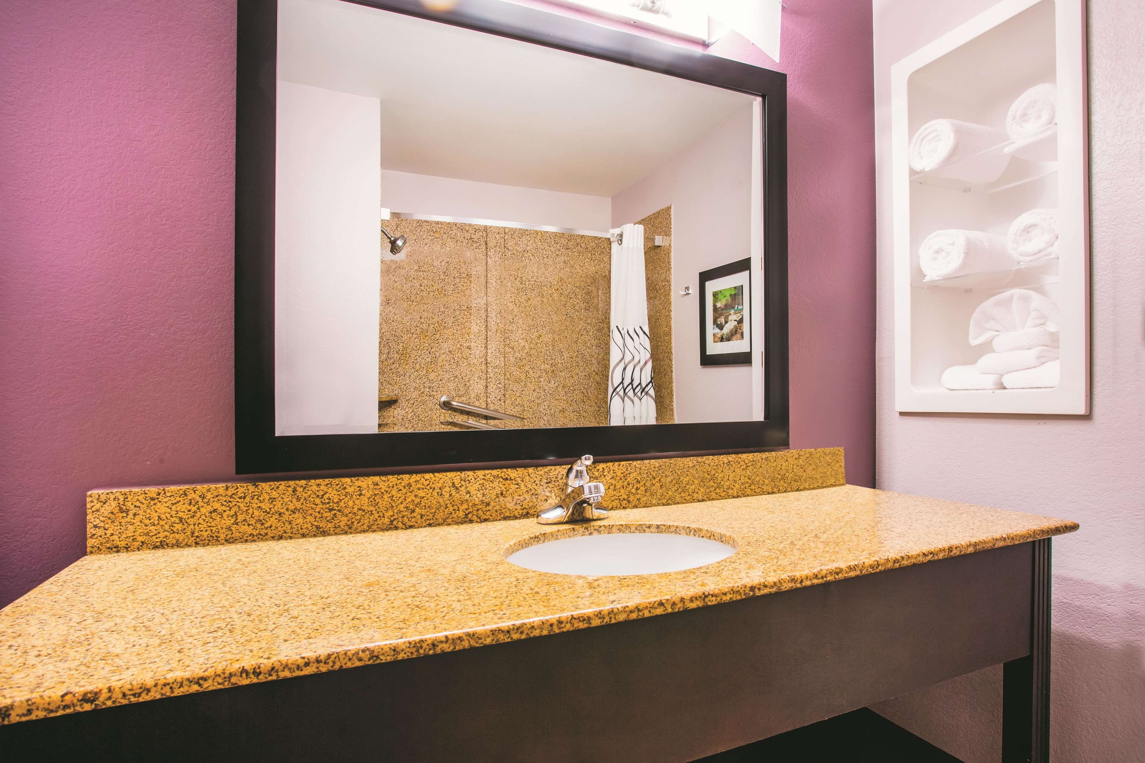 premium bedding, desk, blackout curtains, iron/ironing board