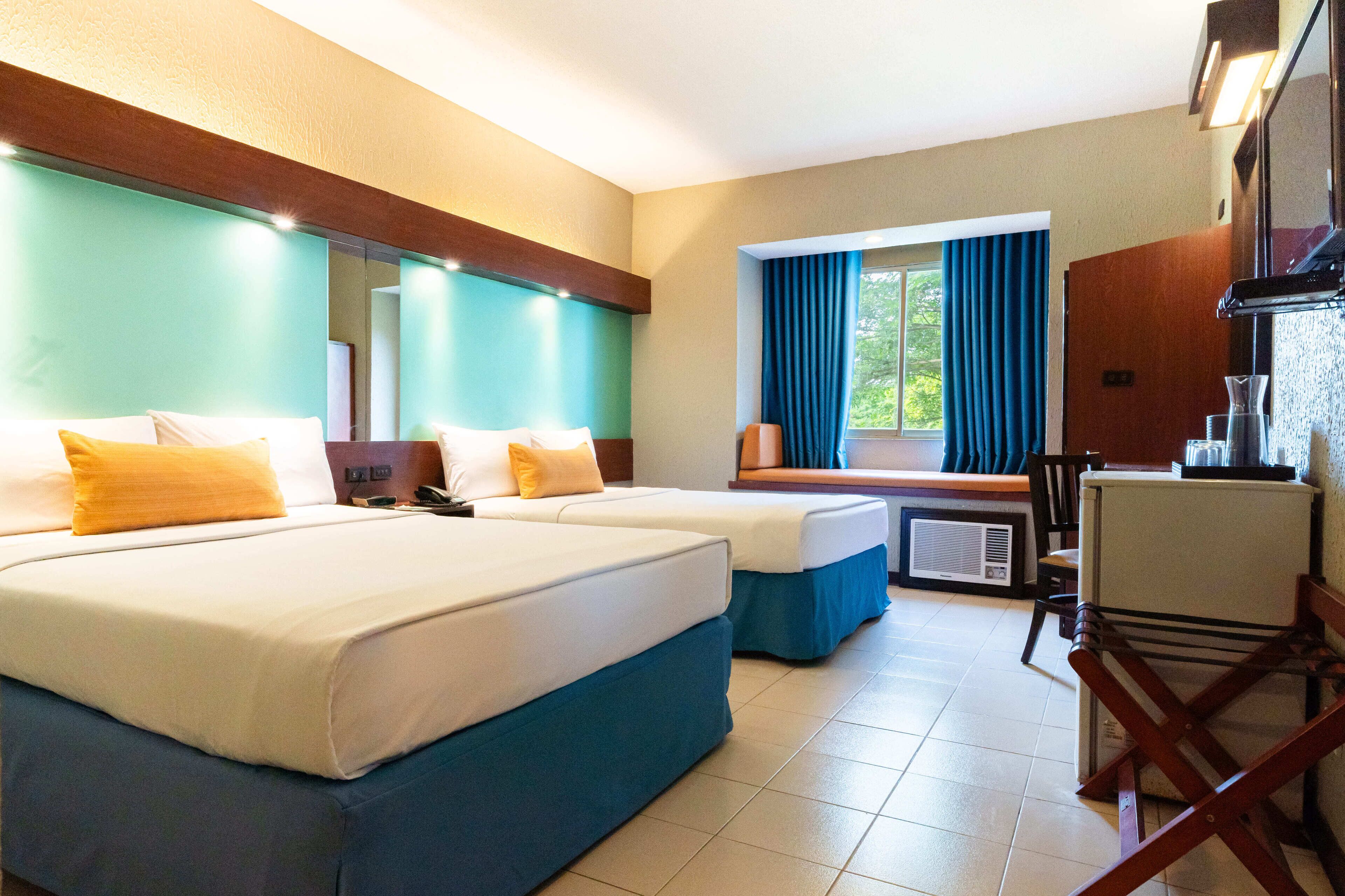 Room, 2 Queen Beds, Non Smoking | In-room safe, desk, free cribs/infant beds, free rollaway beds