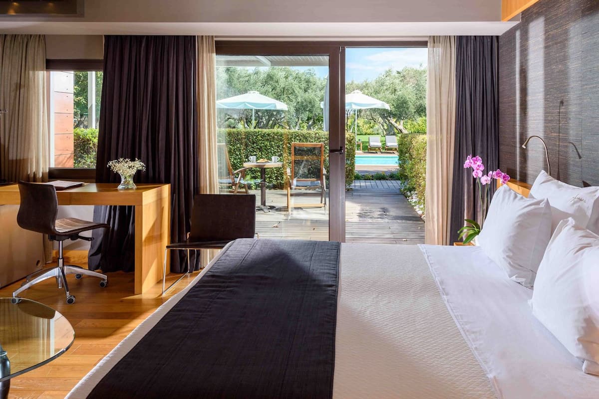 superior double room, pool front | 1 bedroom, premium bedding, minibar, in-room safe