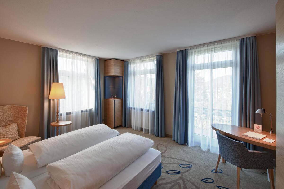 Hypo-allergenic bedding, pillow-top beds, minibar, in-room safe