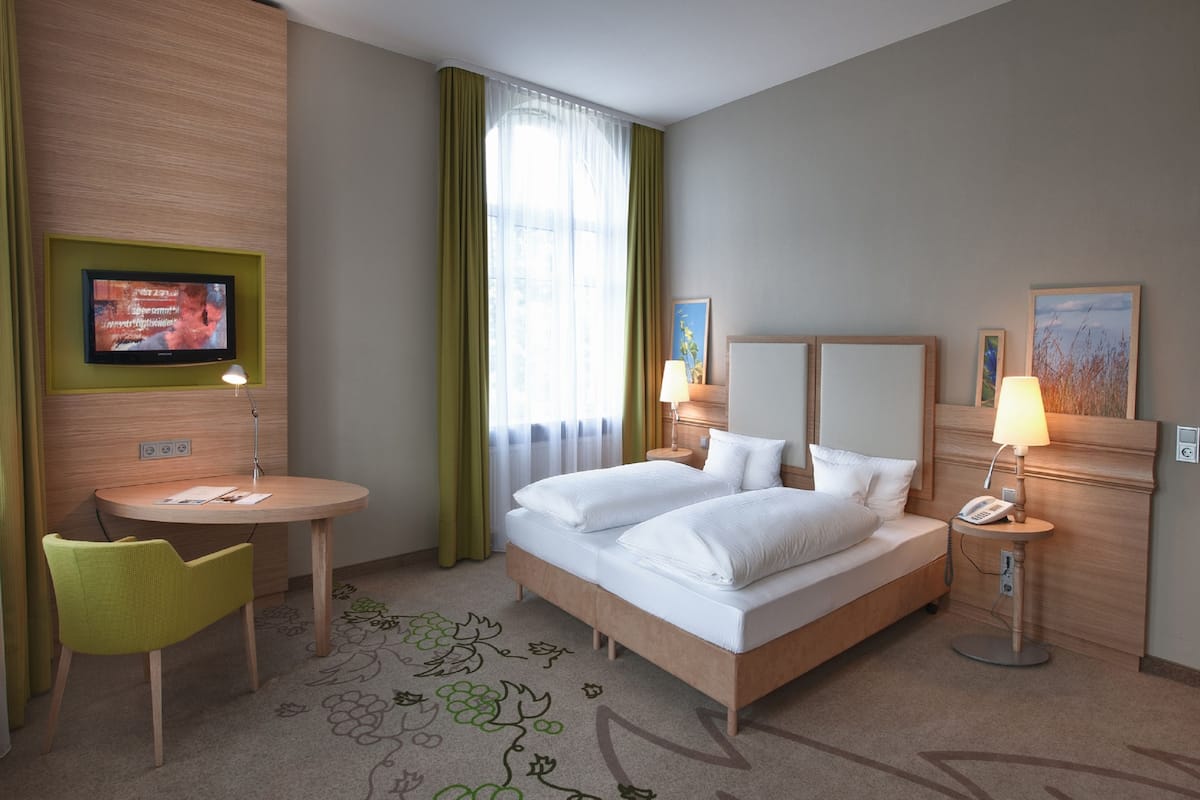 Hypo-allergenic bedding, pillow-top beds, minibar, in-room safe