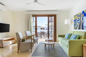 Apartment, 2 Bedrooms | Living area | 32-inch flat-screen TV with digital channels, TV - Royal Tenerife Country Club (San Miguel de Abona)