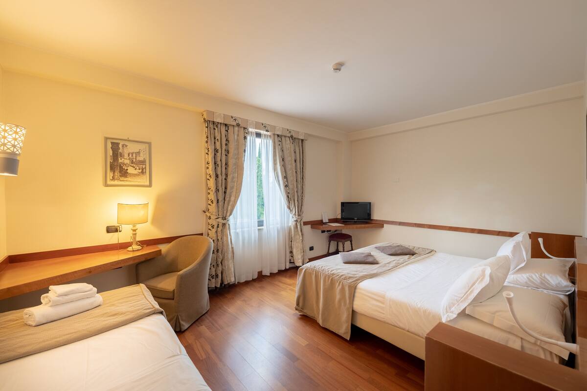 Family Room | Premium bedding, minibar, in-room safe, desk