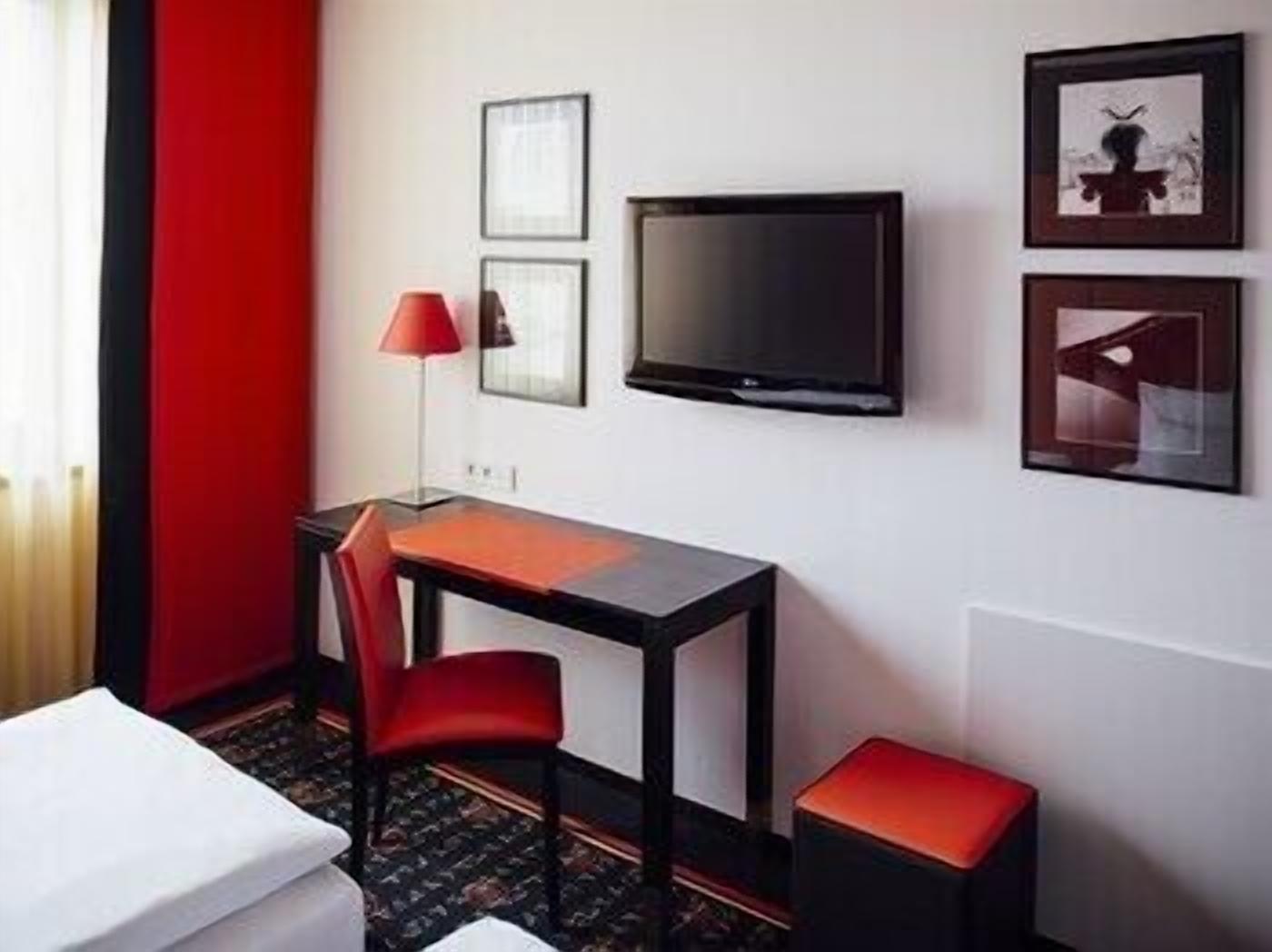 Hypo-allergenic bedding, down comforters, minibar, in-room safe