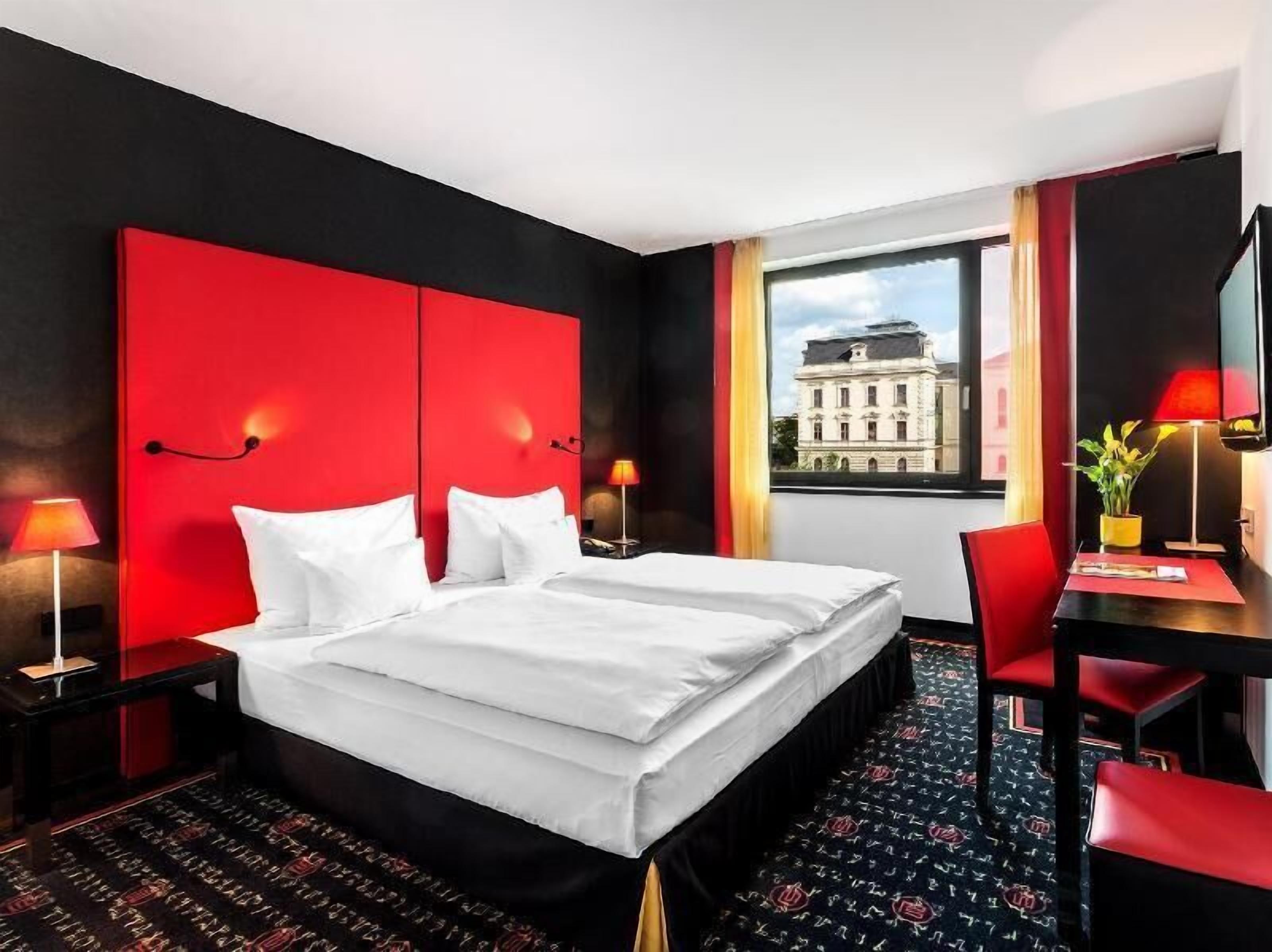 Hypo-allergenic bedding, down comforters, minibar, in-room safe