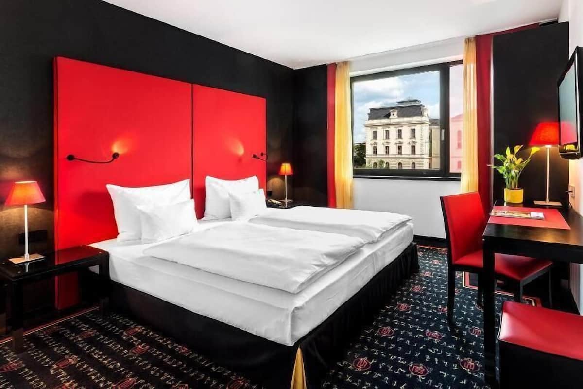 Hypo-allergenic bedding, down comforters, minibar, in-room safe