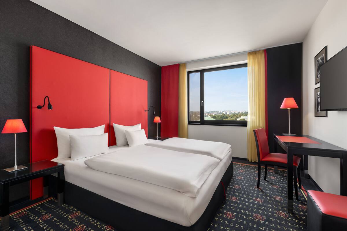 hypo-allergenic bedding, down duvets, minibar, in-room safe