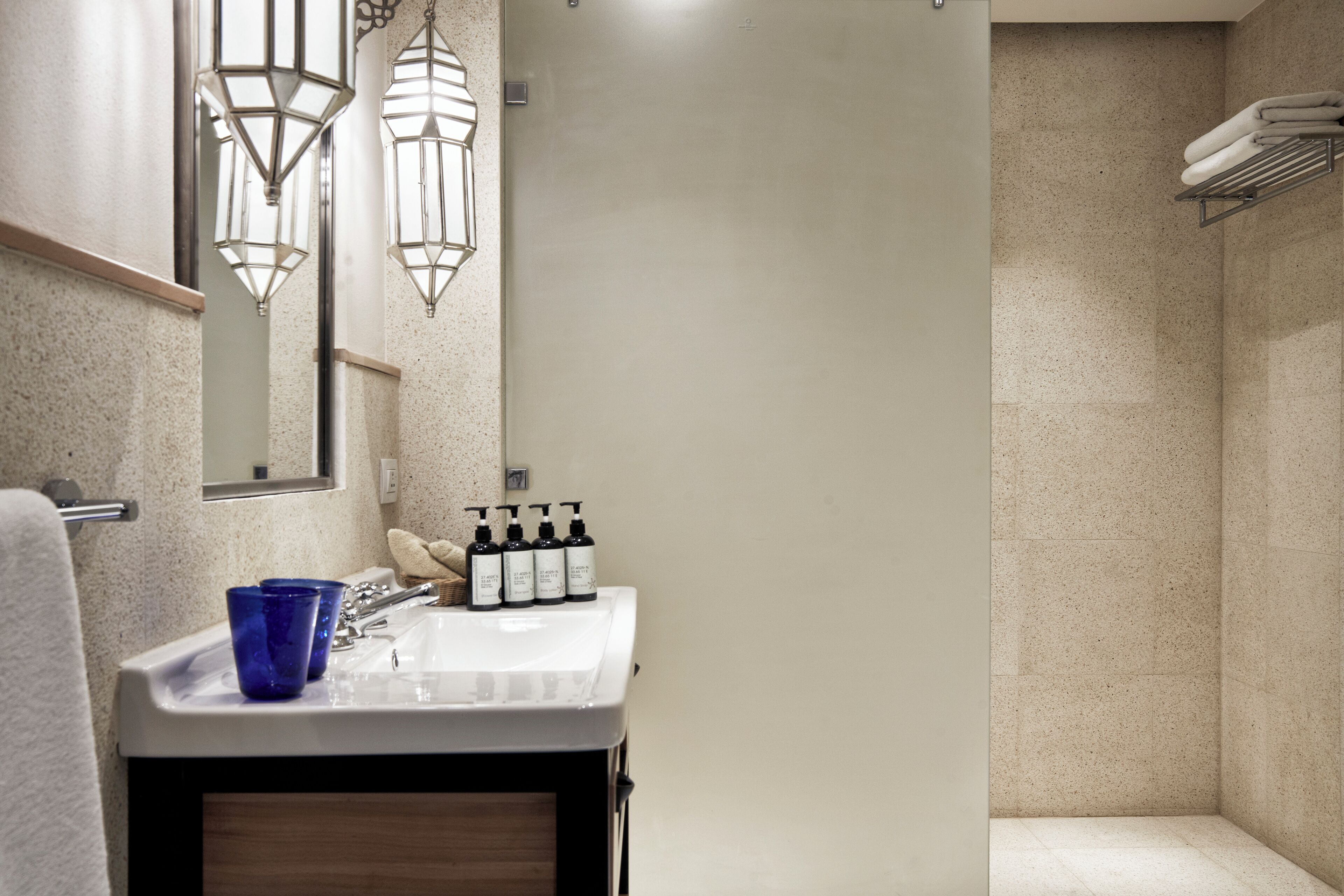 shower, eco-friendly toiletries, hair dryer, towels