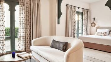 Junior Suite | 1 bedroom, premium bedding, in-room safe, iron/ironing board