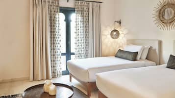 Deluxe Room | 1 bedroom, premium bedding, in-room safe, iron/ironing board