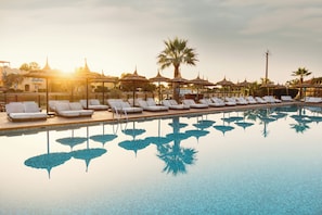 Outdoor pool, pool umbrellas, pool loungers
