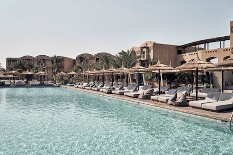 Outdoor pool, pool umbrellas, sun loungers