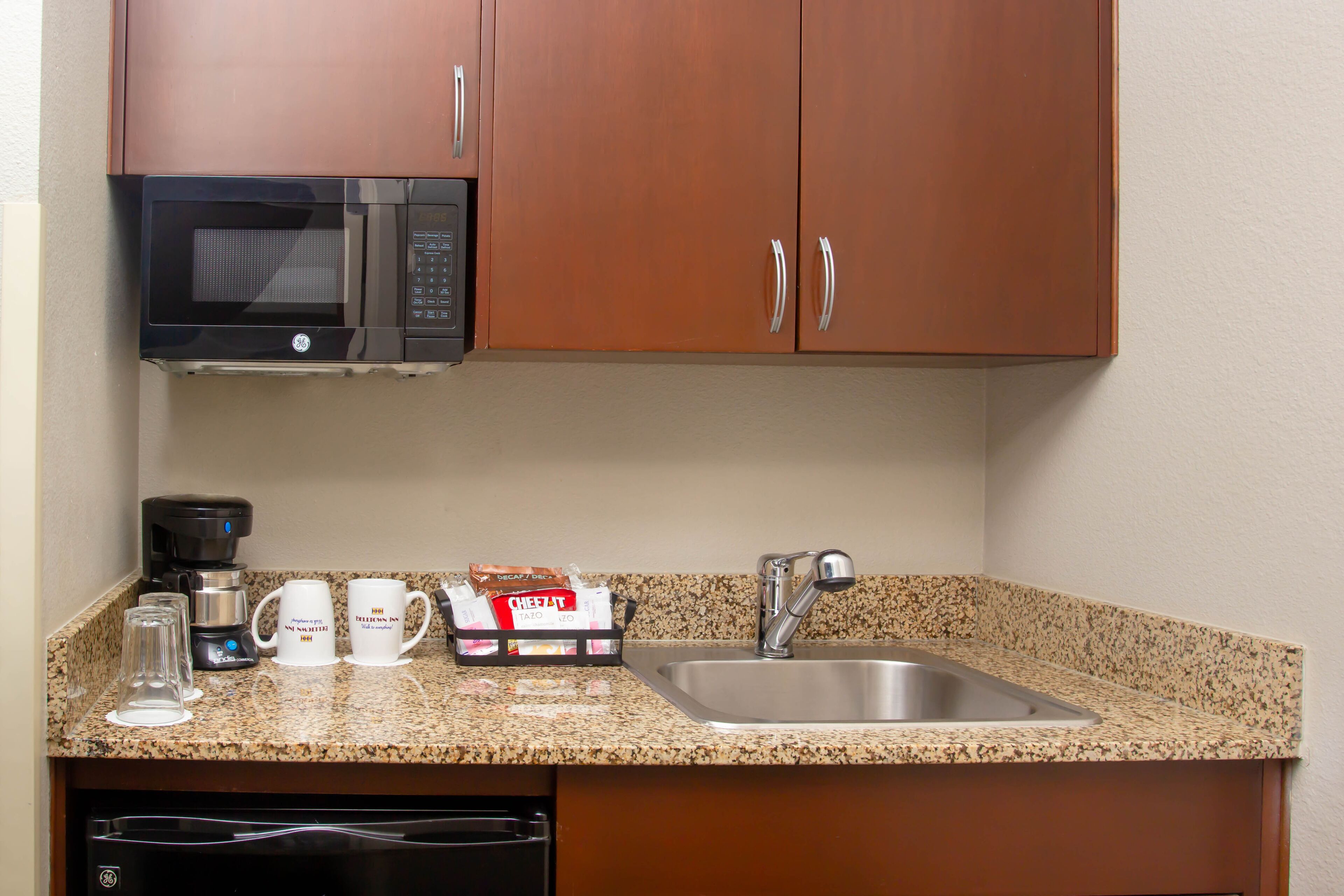 queen guestroom | private kitchenette | fridge, microwave, coffee/tea maker