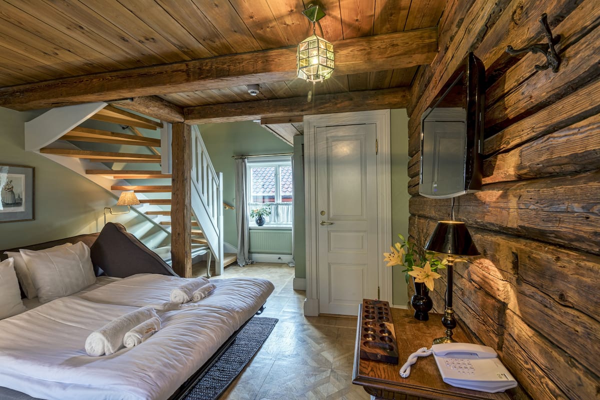 family room, 1 queen bed with sofa bed | in-room safe, individually decorated, individually furnished, desk