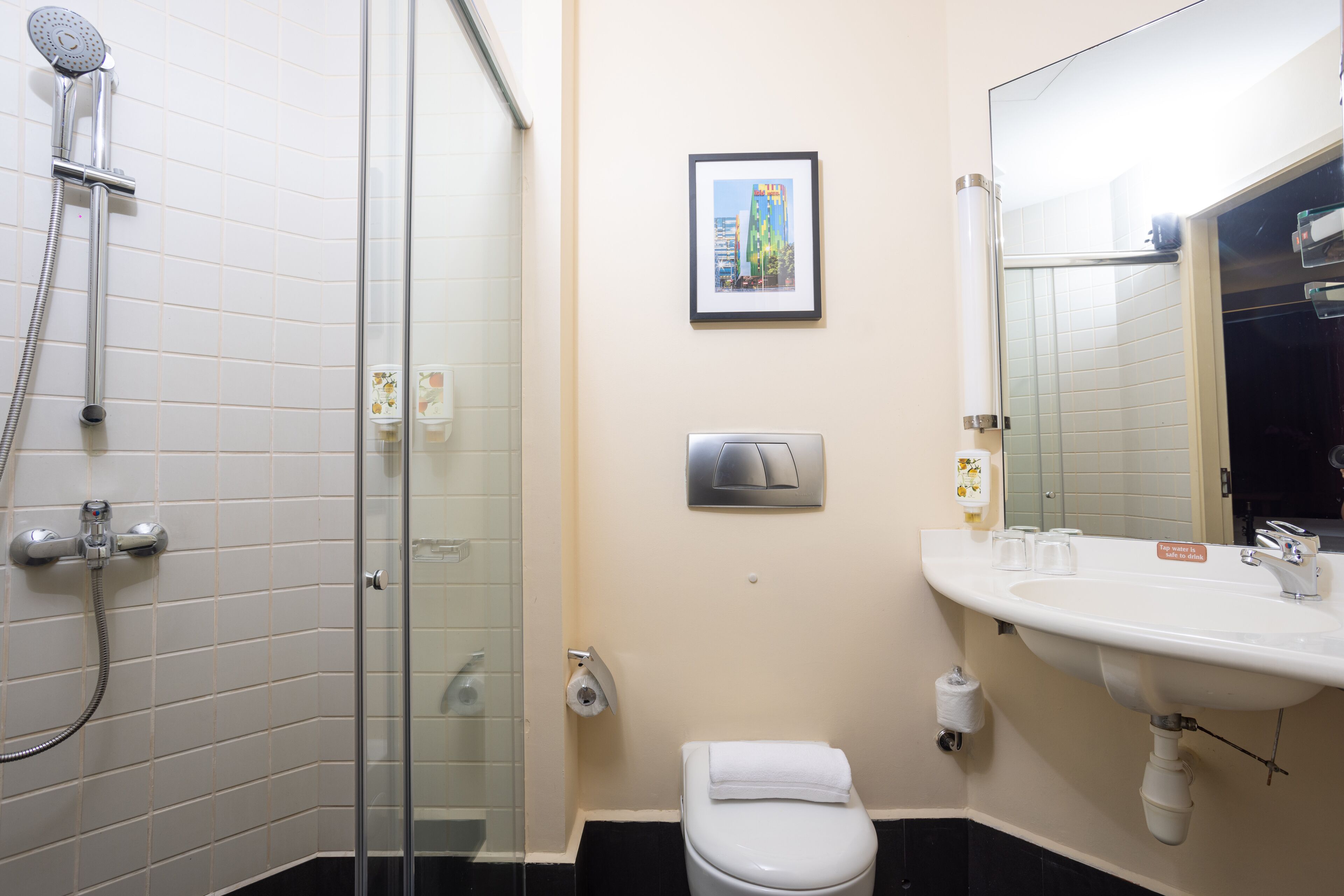 shower, eco-friendly toiletries, hair dryer, towels