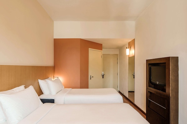 Biancheria da letto di alta qualità, una cassaforte in camera